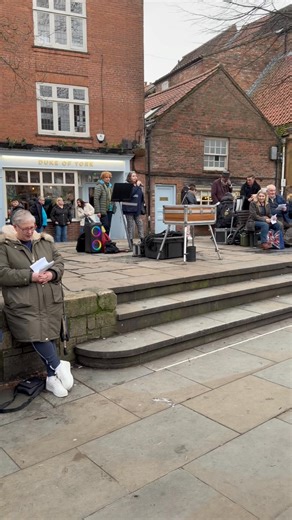 Here’s a very brave Mama Tuneless kicking off the flash mob & taking the unsuspecting shoppers in York by surprise! | Tuneless Choirs