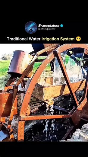 eraexplainer on Instagram: "A traditional water wheel (noria) lifts irrigation water using only the river’s flow. As the wheel turns, buckets scoop water upward and pour it into channels, feeding fields continuously without fuel or electricity. Simple mechanics, gravity, and timing keep it running as long as the stream flows. We do not own any of the content. All credit goes to the respective owners. No copyright infringement intended."
