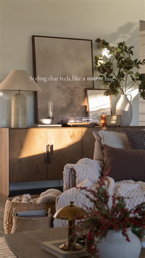 Katy Stillwell | Home Decor & Design on Instagram: "Warm living room & sideboard styling that makes this space feel like a warm hug 🤎✨ Adore my new art pieces from @madelynnavehome & the cozy vibe they bring to this otherwise very plain wall! 🔗 See something you love? Follow @katystillwell & mention HOME for the details! Art details: Large Art - Stillness 36" W x 48" H Walnut floater frame Small art- Autumn Aspen 16" W x 20" H Walnut frame canvas"