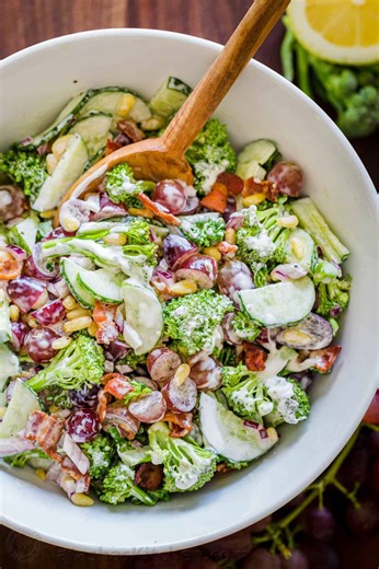 The flavor and texture combination of this broccoli grape salad is AMAZING...Recipe: https://natashaskitchen.com/broccoli-grape-cucumber-salad/ | NatashasKitchen.com
