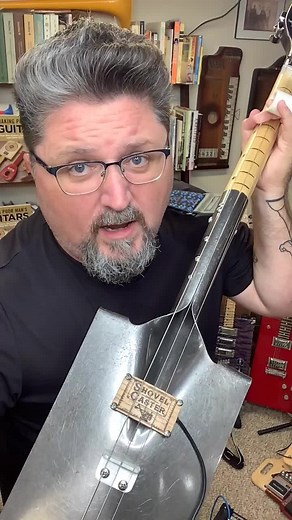 3-String Shovel Guitar with Bone Slide | StubbySlide.com