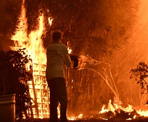 Fires continue to burn California at both ends, killing several
