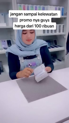 Unboxing a New Mobile Phone in a Retail Store