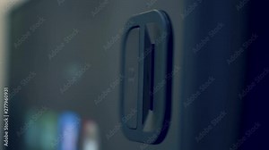 Inserting coin into a vending machine and pressing return coin button