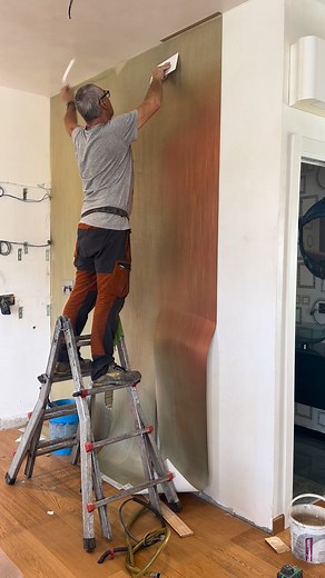 Special made wallpaper is being installed this morning for the new kitchen. The colors will set off the new kitchen colors in the morning sun. But perhaps the most fun is watching a professional installer make it look so simple. | Tom Leonard