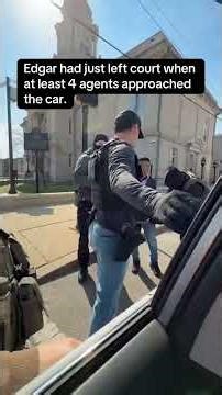 Masked ICE agent breaks car window during arrest in New Jersey