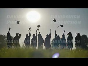 Group of graduates throwing graduation hats in the air