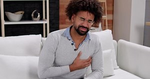Man Chest Pain. Angina Or Heart Attack
