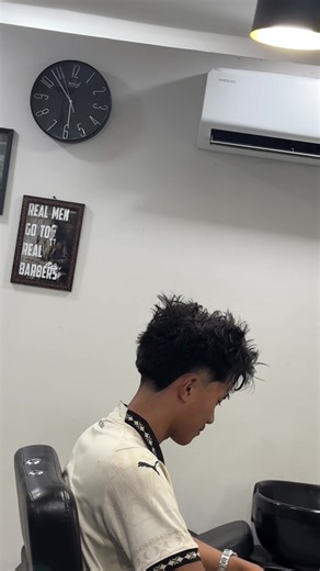 Stylish Taper Fade Haircut at the Barbershop