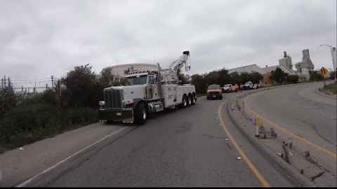 Using a 75ton rotator to upright a tractor trailer