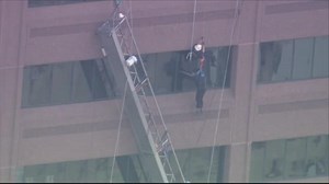 Window washer rescued after scaffolding malfunctions
