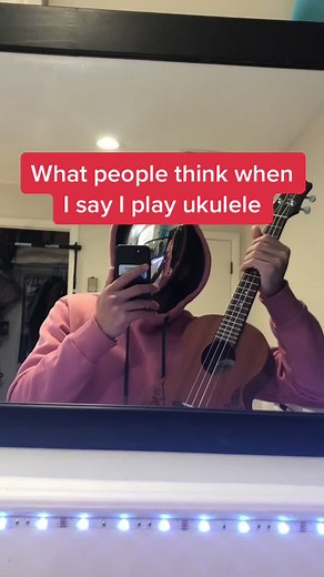 Engaging Ukulele Performer Responds to Comments with Original Songs and Chill Vibes