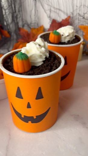 Comment DIRT for this spooky Graveyard Dirt Cups recipe! 🎃👻 You’ve heard of dirt pudding, right? It’s the perfect treat to turn into a Halloween snack for kids. Just mix crushed cookies with pudding, top with spooky whipped cream ghosts, and decorate for a festive party snack. #halloweendessert #halloweentreats #graveyarddirtcups #kidfriendlyrecipes #halloweenfun https://www.momlovesbaking.com/graveyard-dirt-cups/ | Mom Loves Baking
