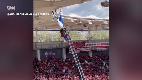 See moment parachutist crashes into rugby stadium