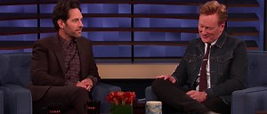 Paul Rudd Says He Almost Chose 'Baby Geniuses' Instead Of 'Mac And Me' For His Long-Running Conan O'Brien Show Prank - SlashFilm