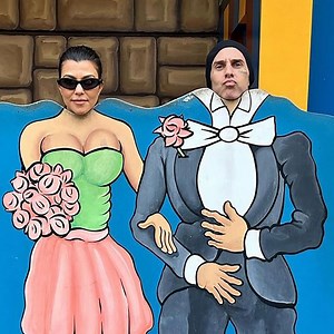 Kourtney Kardashian and Travis Barker's Baby Boy Rocky Follows in Dad's Footsteps in Rare Photo