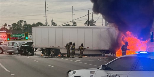 LOOK: Semi truck catches on fire after crash in Douglas