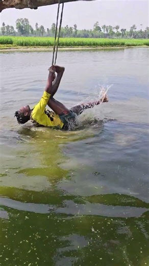 Hanging from a tree with a rope