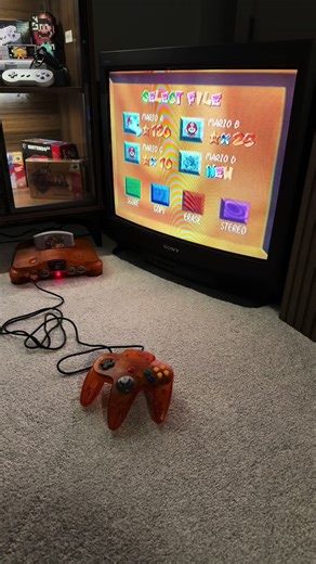 Super Mario 64! One of the games recently featured in my previous videos. For something as simple as the File Select screen, I remember catching myself sitting at this screen just to listen to the music as a kid. Fun Fact! That 120 Star save file is my original save from when I first played Super Mario 64 back in the 90s. Did you ever get all 120 Stars? #n64 #mario #supermario64 #retrogaming #nostalgia