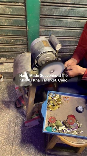 Young man, making souvenirs at the Khan El Khalili Market in Cairo