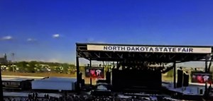 Video of the B-52 bomber aircraft flying over the North Dakota State Fair. It was taken at the time of the near miss with a SkyWest Flight operating as a Delta connection between Minneapolis and Minot. The flight can be seen in the video. | KFYR-TV