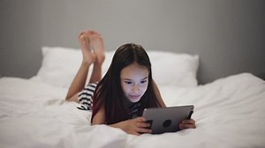 Little Girl Uses Tablet Bed Before Stock Footage Video (100% Royalty-free) 17768065 | Shutterstock