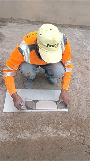 How to professionally drill a hole in ceramic tiles for electrical switches.