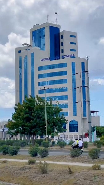 Simu 2000, also known as Mawasiliano Towers, the headquater of Tanzania Communication Regulatory Authority (TCRA), . Makao Makuu ya Mamlaka ya Mawasiliano Tanzania, Dar Es Salaam, Tanzania. . 🎥 @karibudaressalaam_tz . 🎶 Dr John Pombe Magufuli, the 5th President of United Republic of Tanzania. .