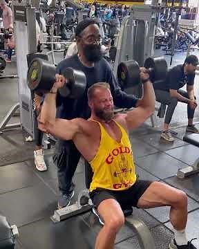 THE SEATED DUMBBELL SHOULDER PRESS IS A STAPLE EXERCISE