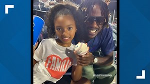 Dad catches foul ball at baseball game... breaks his hand in the process