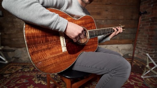 Get ready to be transported to a tropical paradise with this stunning Bourgeois OM (#9321)! Crafted with a master grade koa top and back, this guitar is a true work of art. The Style 45 abalone appointments, including the rosette, backstrip, and purfling, add a touch of luxury that's perfectly complemented by the English holly bindings and accents. But it's not just about the breathtaking aesthetics – the aged tone torrefied bracing and ebony fretboard ensure that this OM has a sound as lush and