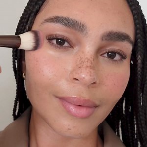 Our favorite kind of lineup: everyday essentials paired with vibrant pops of color. Alexis wears Vanish Airbrush Concealer in shade Sepia, Ambient Lighting Blush in shade Sublime Flush, and Phantom Volumizing Glossy Balm in shade Crave. Shop now at Sephora. | Hourglass Cosmetics