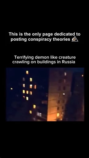 Conspiracy Theories on Instagram: "A strange creature was caught on camera crawling across a building in Russia, moving in a way that doesn’t match any known animal. The figure clings to the walls with long, spider-like limbs, pulling itself upward with smooth, unsettling movements. In the footage, its shape shifts as it climbs, almost like its body isn’t fully solid. People compared it to Venom or some kind of mutated spider, but no one has been able to explain what it actually is. What do you