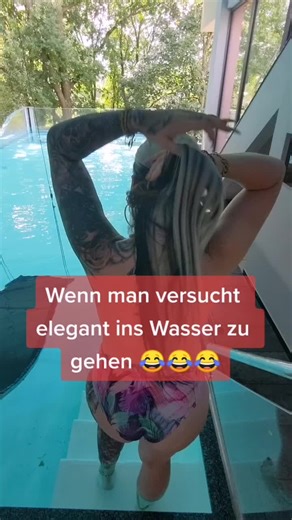 Women in Colorful Swimsuit Ziplining into Pool