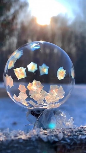 Who would have thought that bubbles could get even more magical? Freeze one and watch what happens 🫧❄️ ⠀⠀⠀⠀⠀ Reposted @geometry.in.nature Wow! Bubble fractally freezing! When a bubble freezes, it can create some beautiful and intricate fractal ice patterns. As the water inside the bubble begins to freeze, it expands and creates pressure on the surface of the bubble. This pressure causes the ice to form in a hexagonal pattern, creating a delicate lattice structure that appears to be repeating it