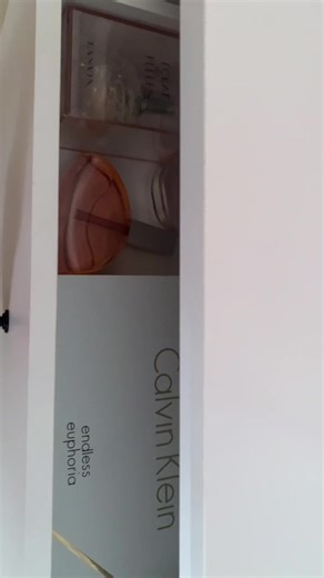 Acrylic Perfume Storage. These storage ideas arent’t just looks-they practical too, organizer help to protect perfumes from dust, spills, and clutter while maximizing your space.Everything stays neat and accessible. #AcrylicPerfumeIdeas #AcrylicPerfume #PerfumeDisplay #PerfumeOragnizer #PerfumeDisplay