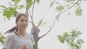 Woman Running in a Park | Free Stock Video Footage