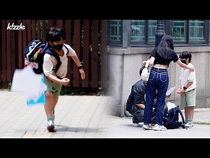 What is the reaction of citizens when a child drops something?