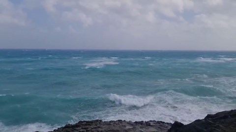 Bermuda: Rough Waves Crash Along Shore as Hurricane Imelda Approaches