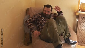 the family is fooling around. parents are playing with a child. parent's love for child