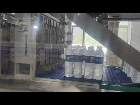 What are the key components of a bottled water filling line?