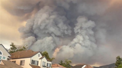 Smoke fills Dove Canyon due to rapidly spreading Airport Fire