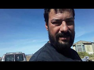 Building a cinder block wall without mortar or a concrete foundation