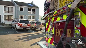 Woman dies after being pulled from burning home in Howard County