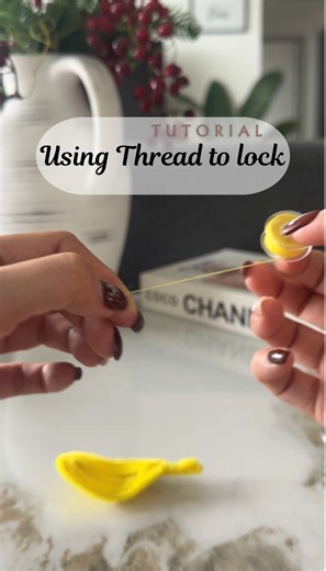 Slow-motion tutorial on how to use thread to lock petals #fuzzywireflowers #diyflowers #tutorials #crafted #pipecleaners