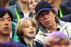 Mick Jagger and his son Deveraux catch the Olympic games in Paris