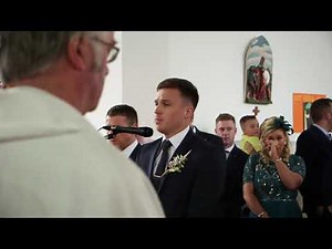 Groom sings his childhood sweetheart bride up the aisle