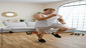 Blond man with beard doing a bodyweight workout at home, displaying health and fitness in a modern living room.
