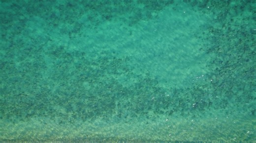 Turquoise sea texture from an aerial shot - Free Stock Video