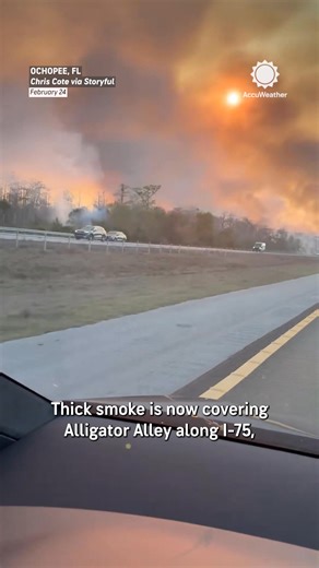 A massive wildfire burning in southwestern Florida is sending thick smoke across Alligator Alley. The National Fire, burning in Big Cypress National Preserve near the Florida Everglades, began on Sunday and has grown to 25,000 acres. The blaze remains uncontrolled. https://bit.ly/4rDAj9h | AccuWeather
